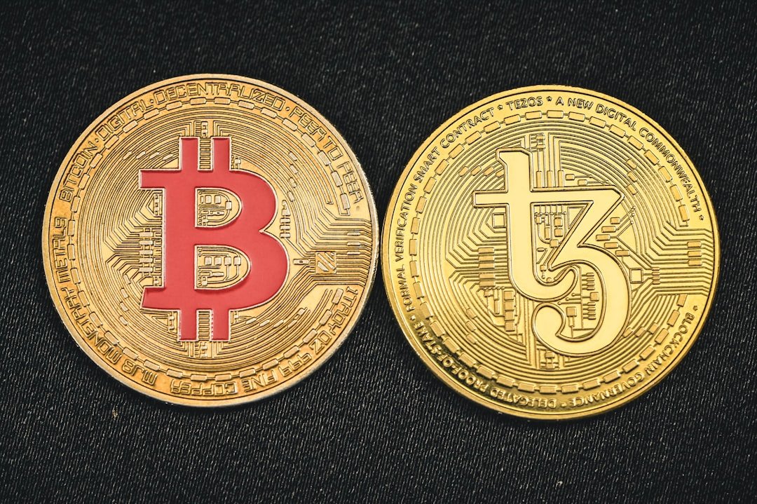 a bitcoin and a bitcoin on a black surface