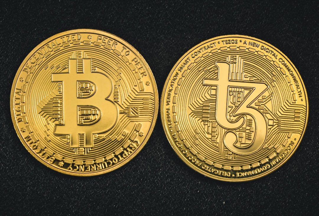 a bitcoin is shown on a black surface