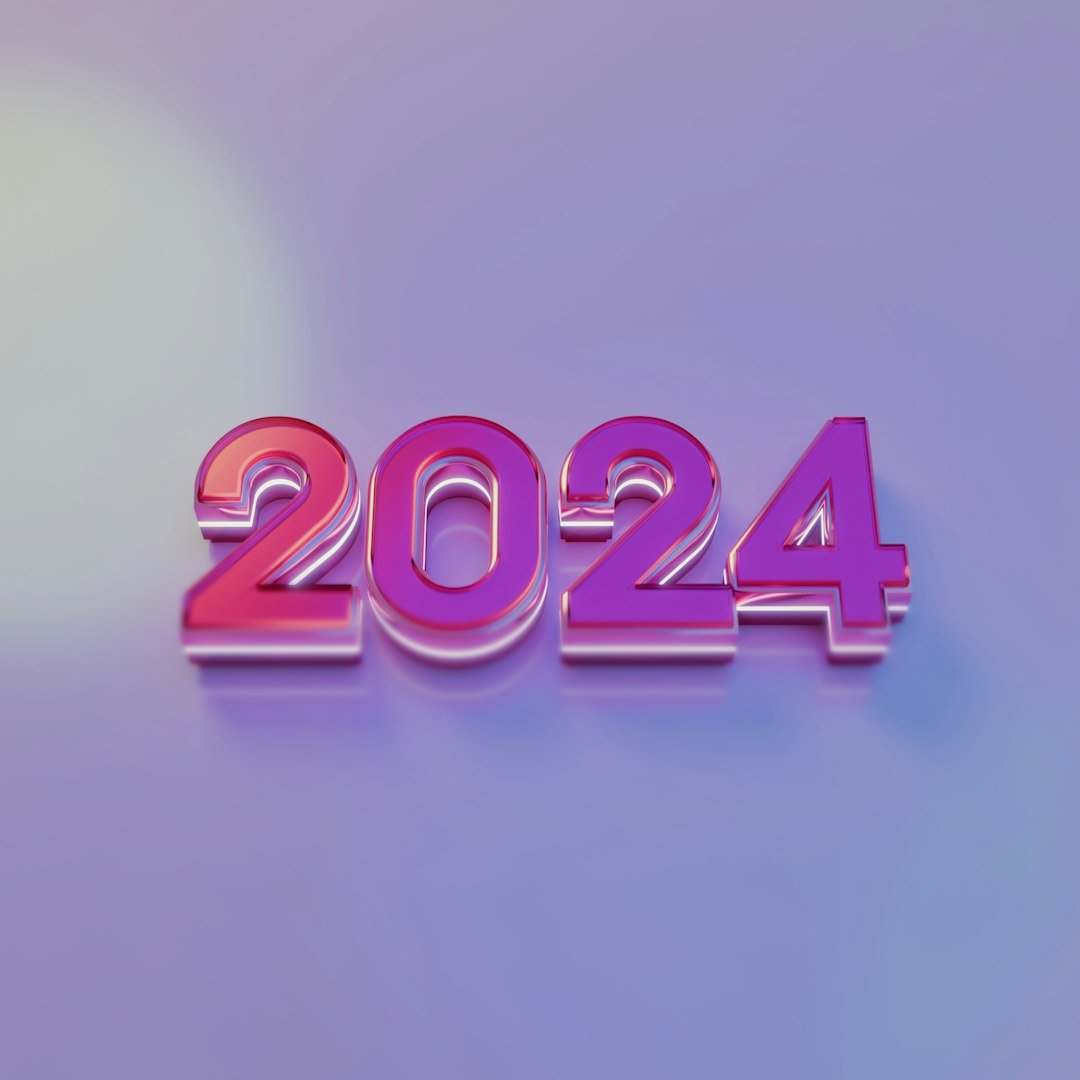 a purple and pink text that reads 2024