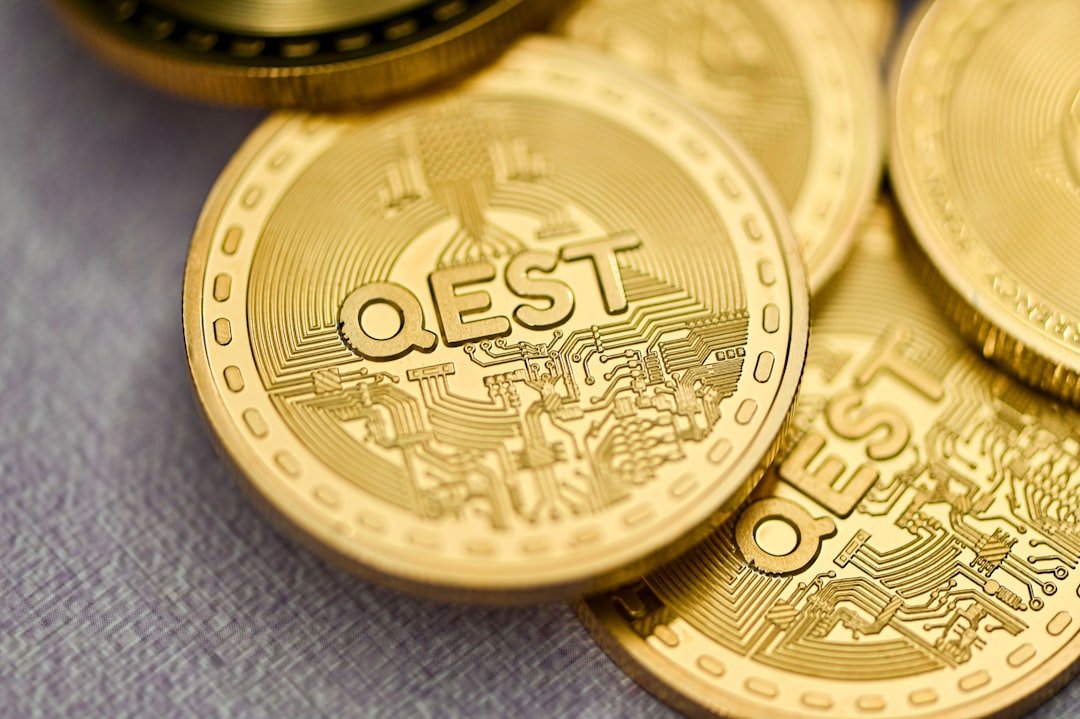 a pile of gold coins sitting on top of a table