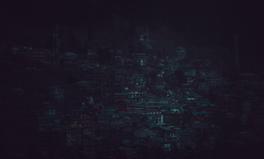 an aerial view of a city at night