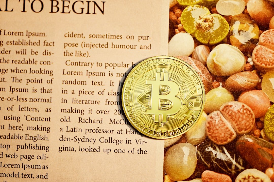 gold round coin on white printer paper