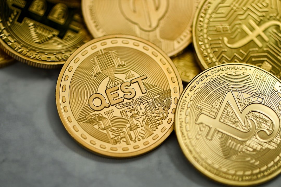a pile of gold bitcoins sitting on top of each other