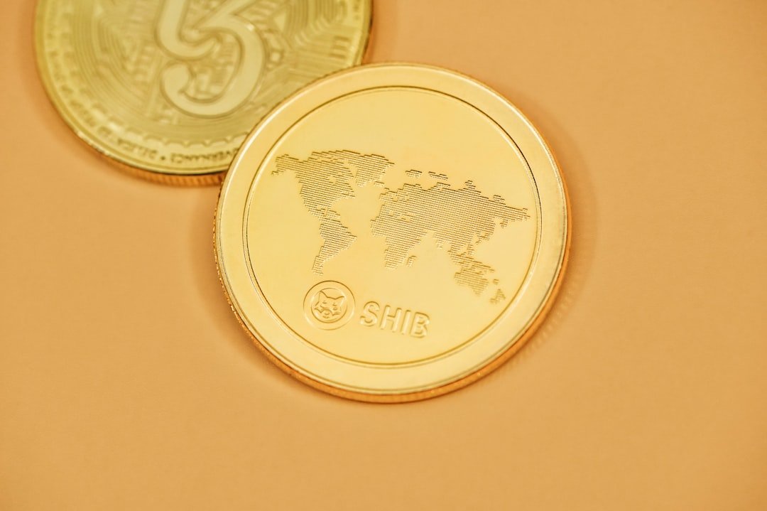 a close up of two gold and silver coins