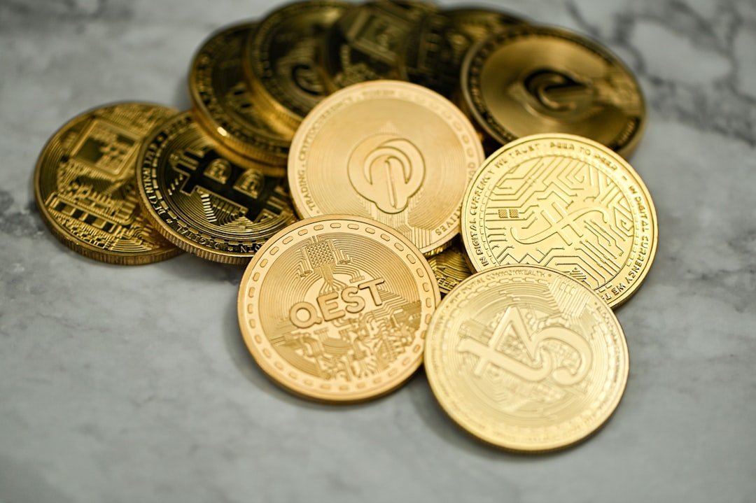 a pile of gold coins sitting on top of a table