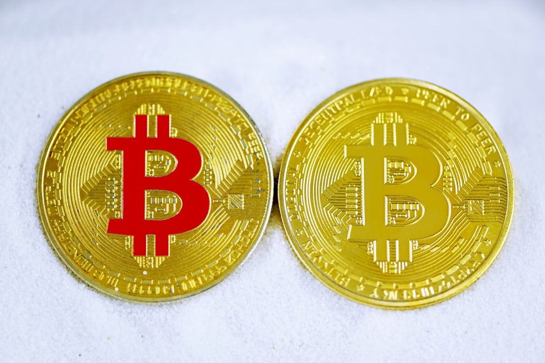 gold and red round coin