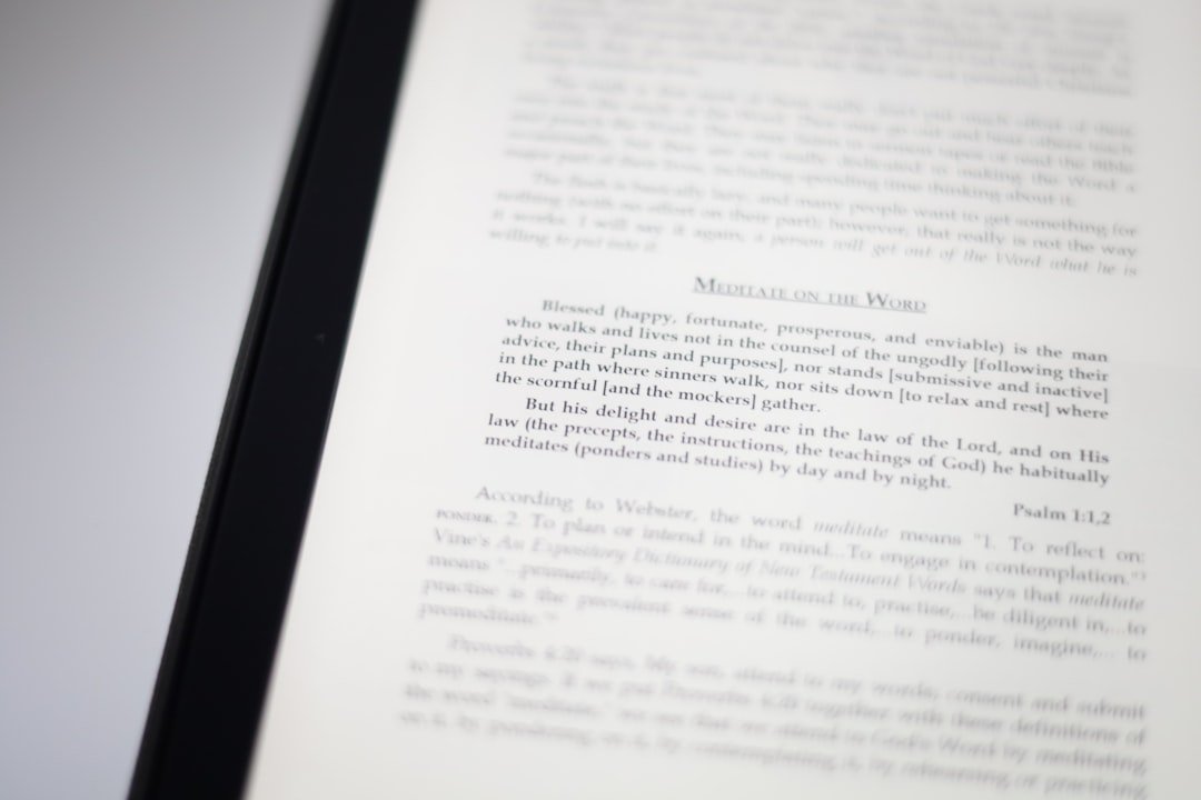 a close up of an open book on a table