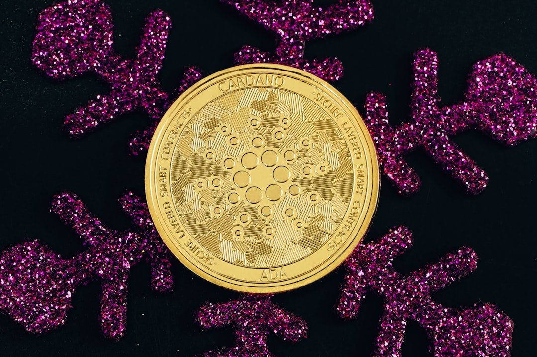 a close up of a gold coin surrounded by purple glitter